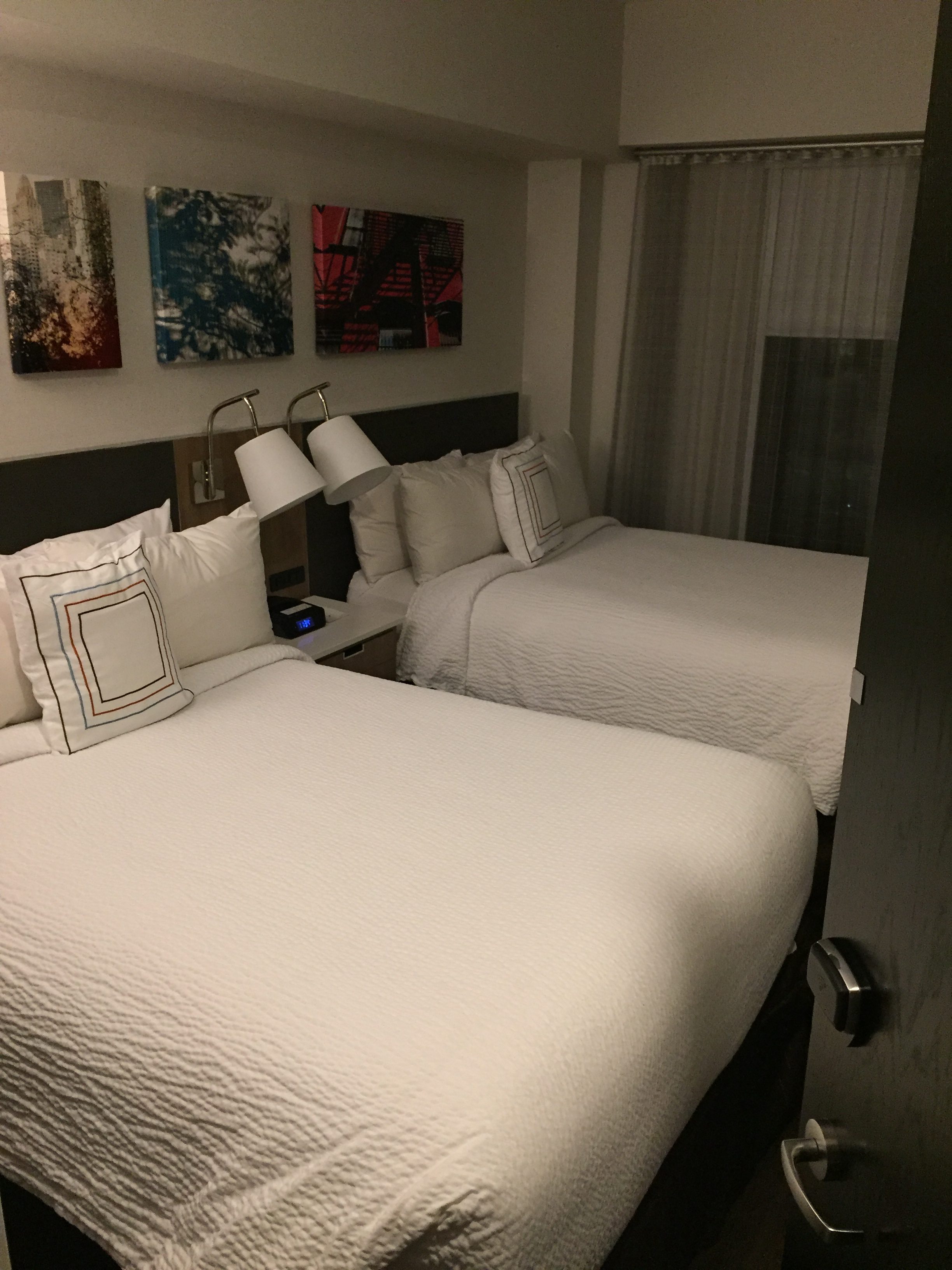 two beds in a hotel room