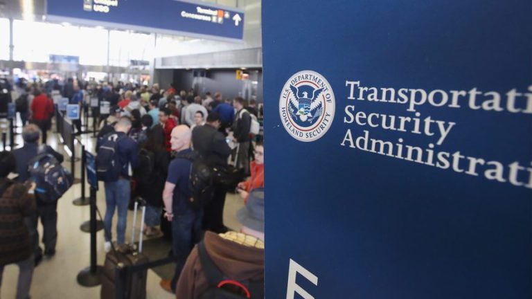 a group of people in a terminal