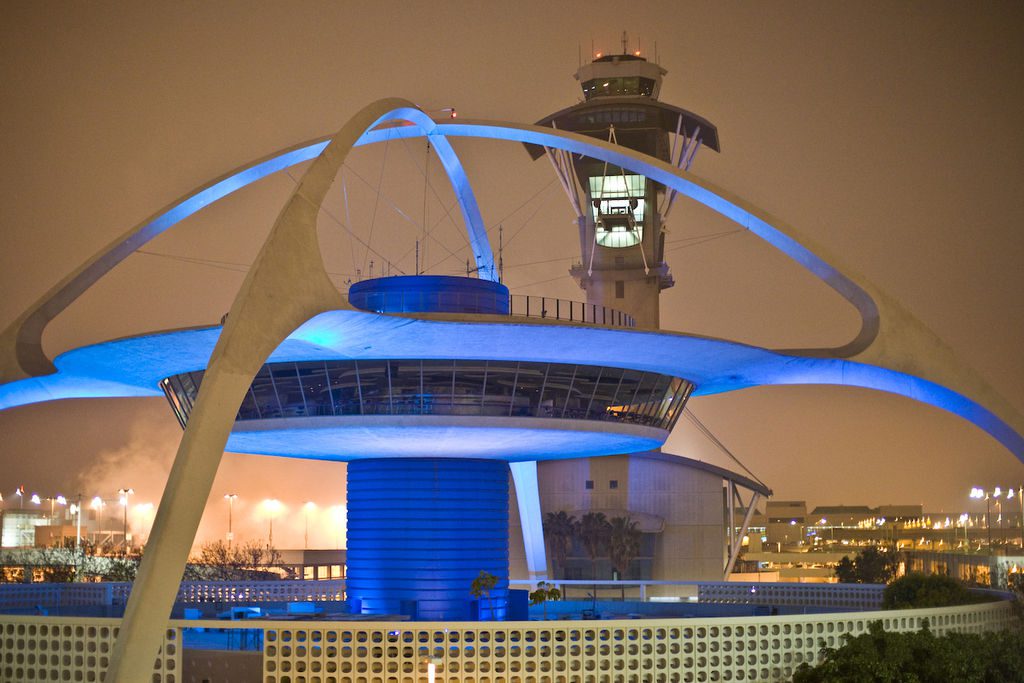 a building with a tower and a control tower