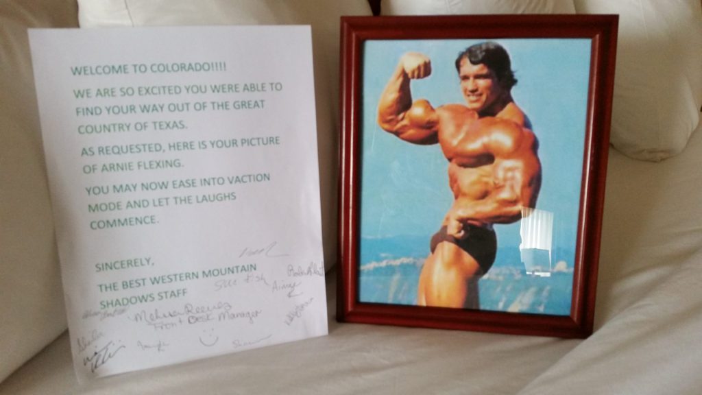 a picture of a muscular man next to a piece of paper