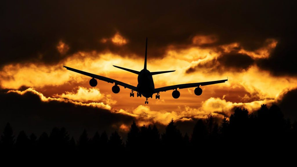 a plane flying in the sky