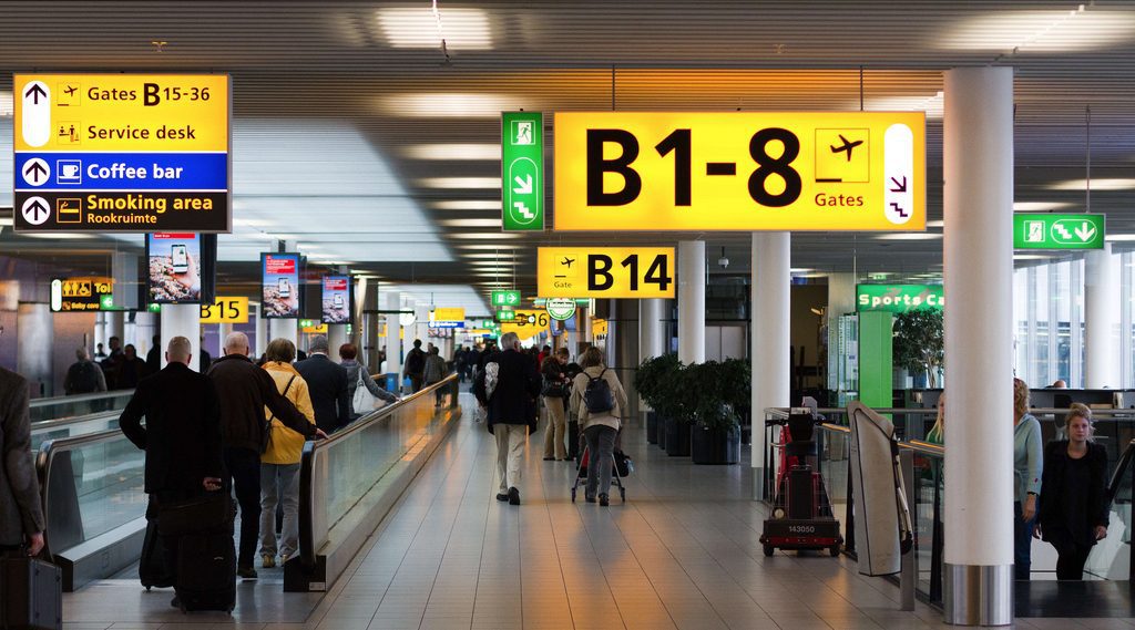 people walking in an airport