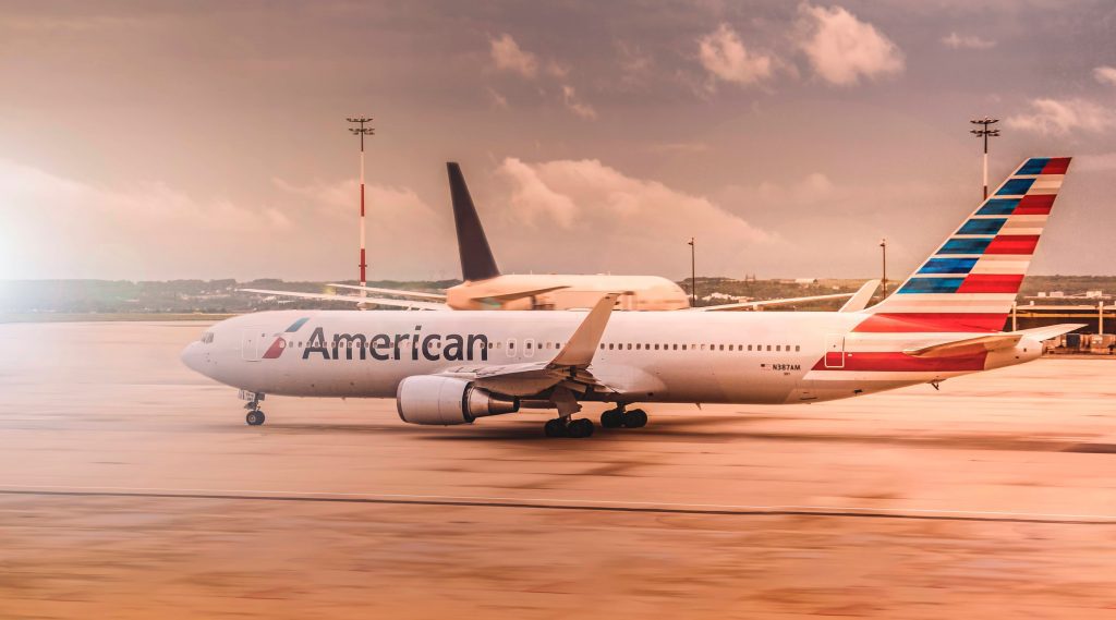 a large white airplane on a runway