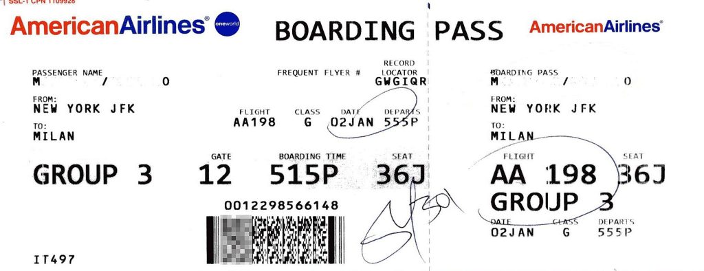 a close-up of a boarding pass