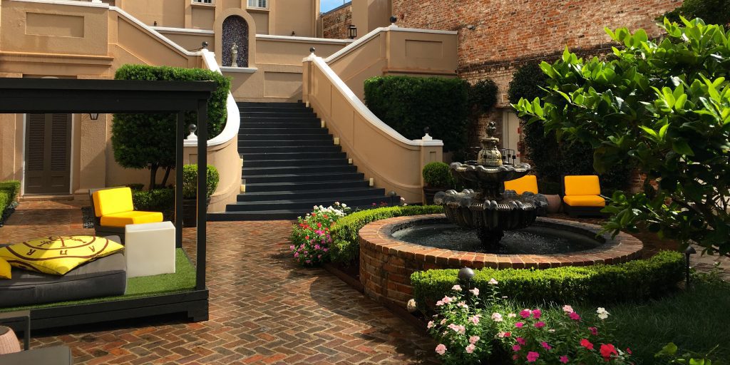 a fountain in front of a building