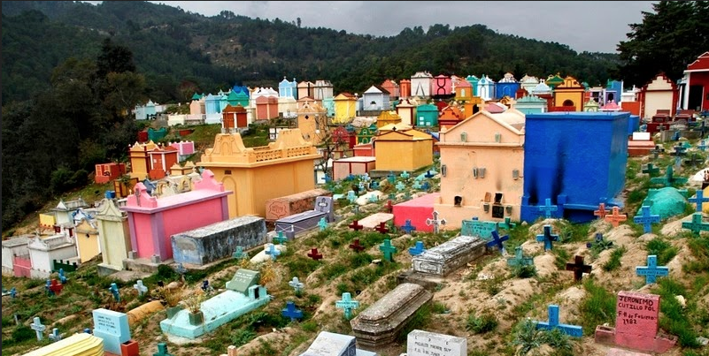 a cemetery with many colorful buildings