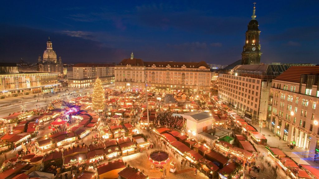 a large city with many tents and lights