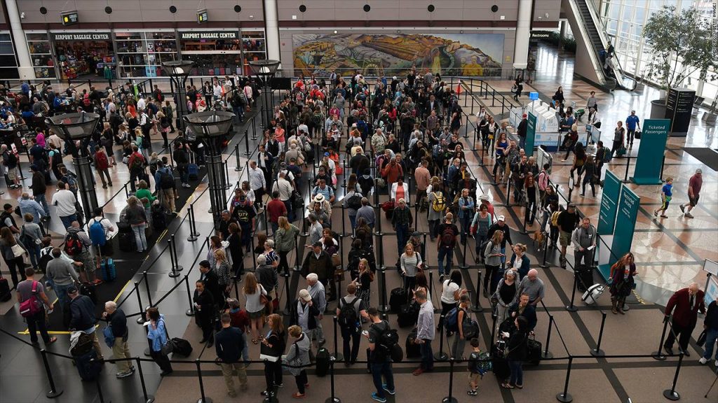 a group of people in a terminal