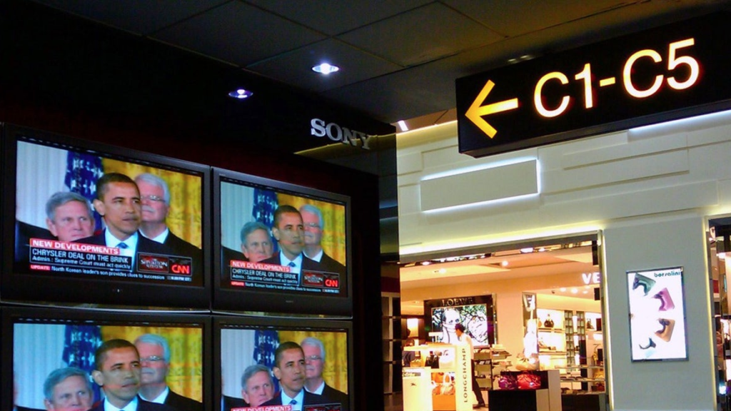 a televisions on the wall of a store