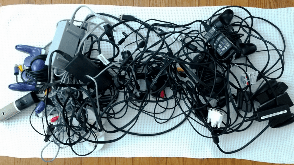 a pile of wires on a white surface