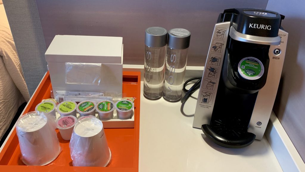 a coffee machine and coffee cups