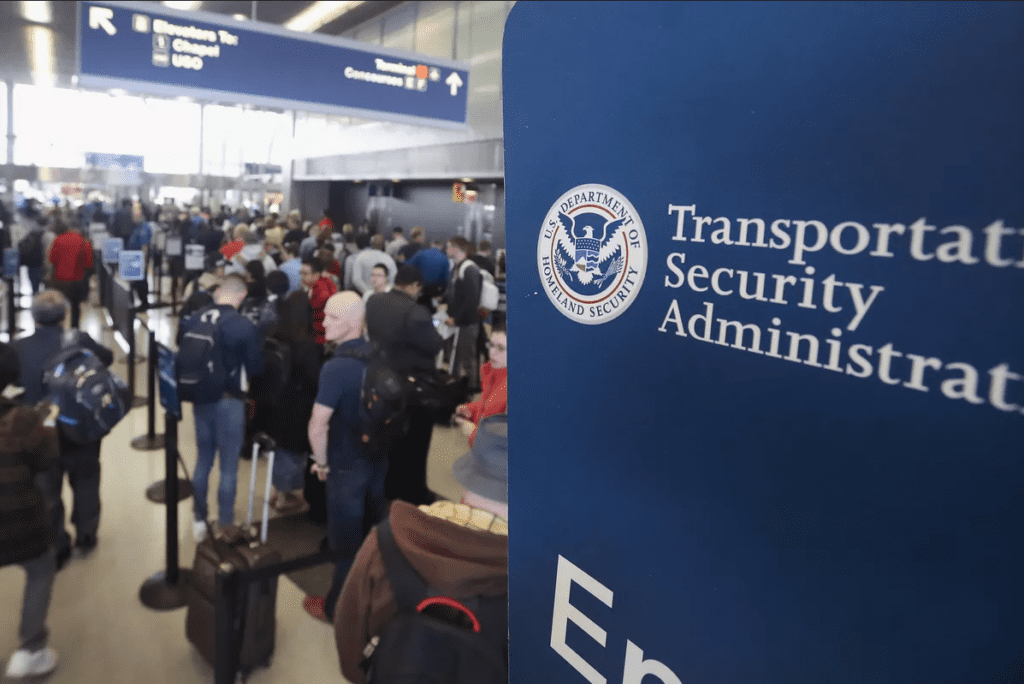 a group of people in an airport