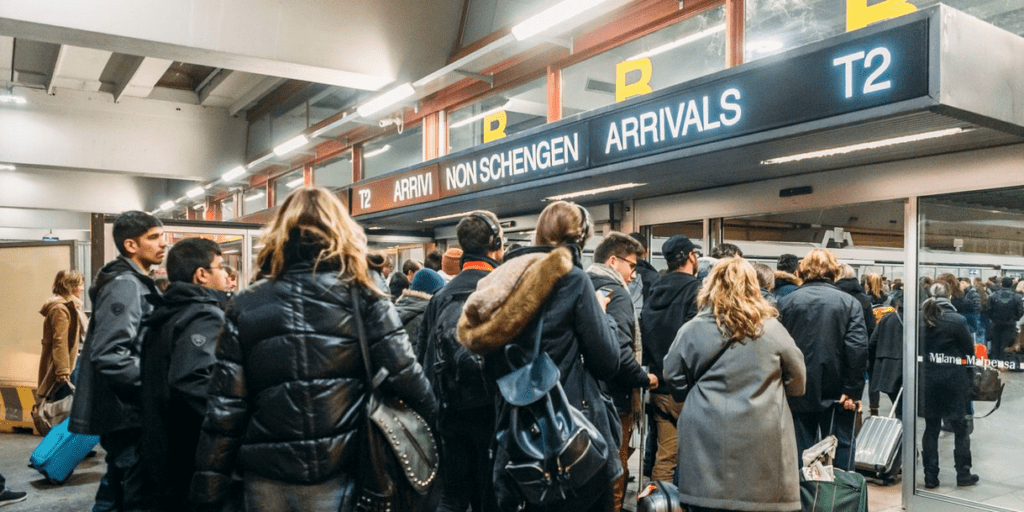 a group of people standing in a line