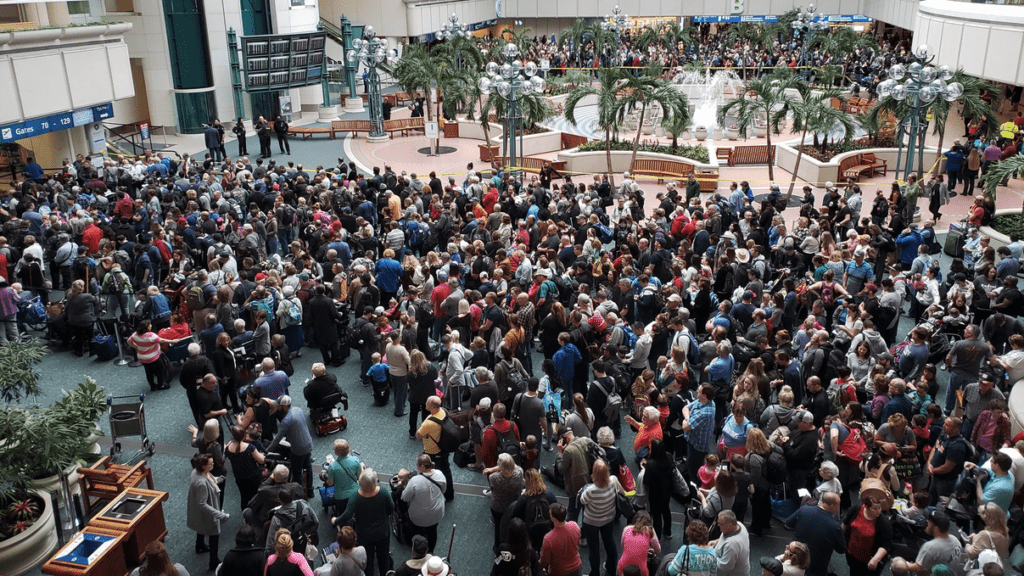 a large crowd of people in a large room