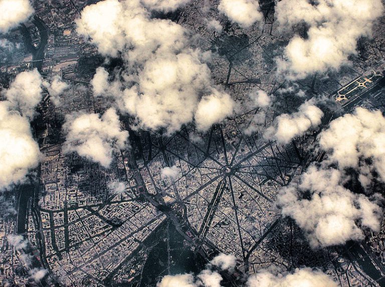 aerial view of a city with clouds