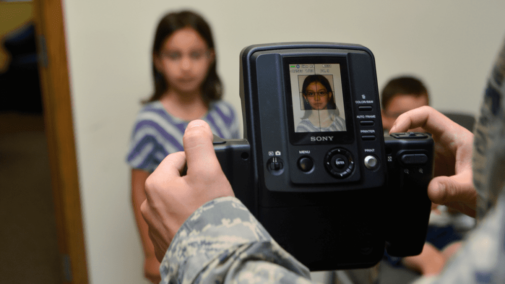 a person holding a camera