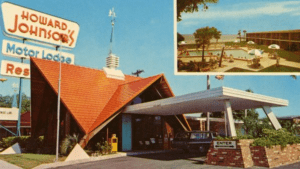 a motel with a car parked in front of it
