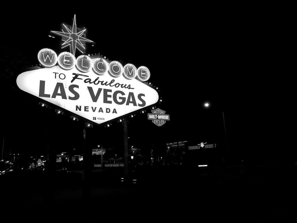 a sign at night with lights