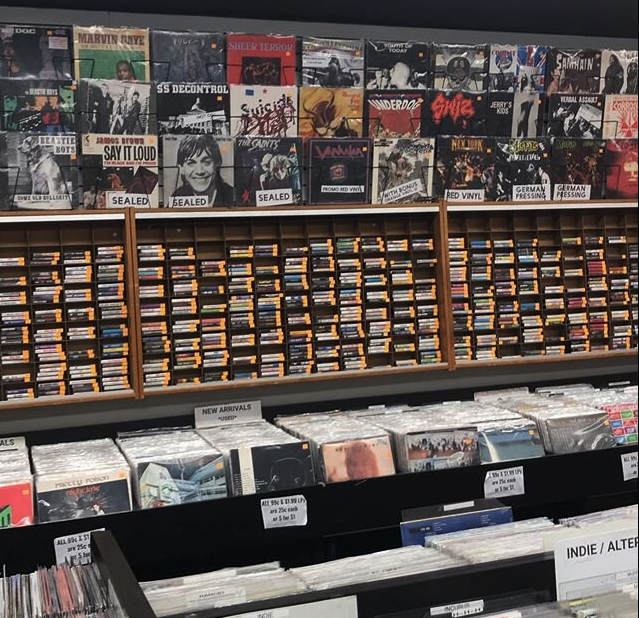 a shelf with records on it