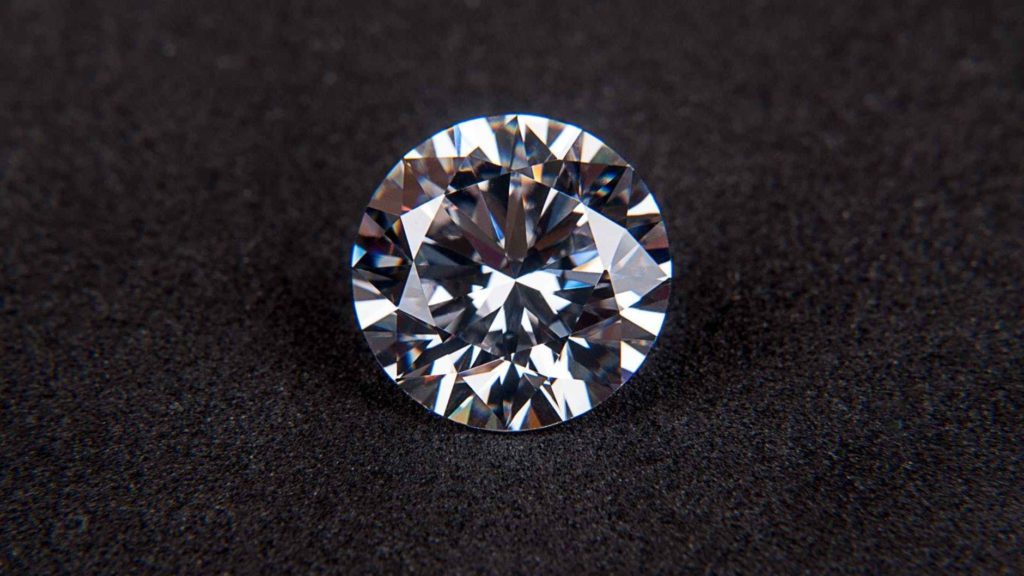 a diamond on a black surface