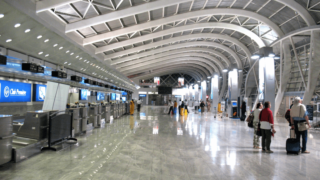 people walking in a large airport