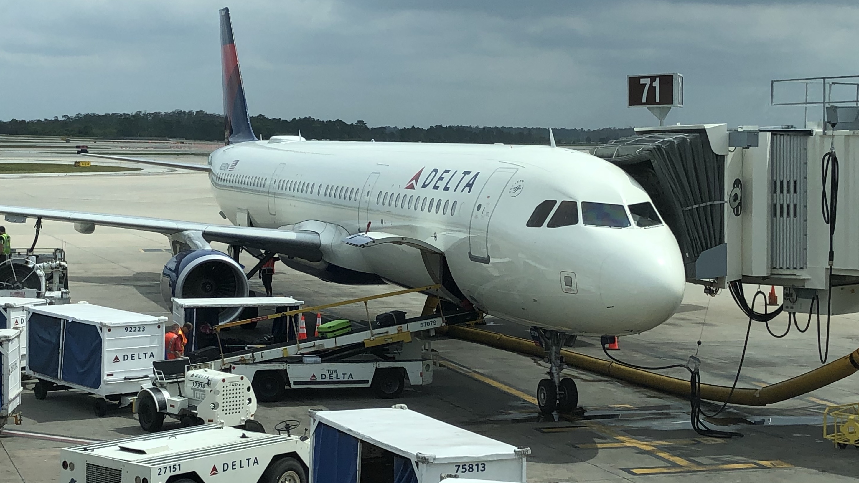 a white airplane at an airport