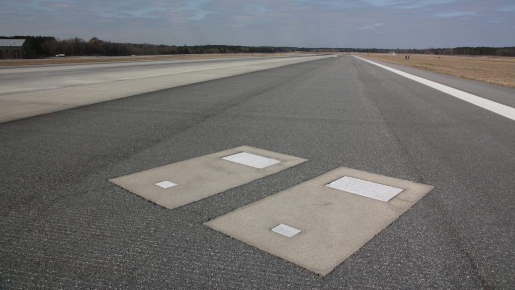 a runway with square markings on it