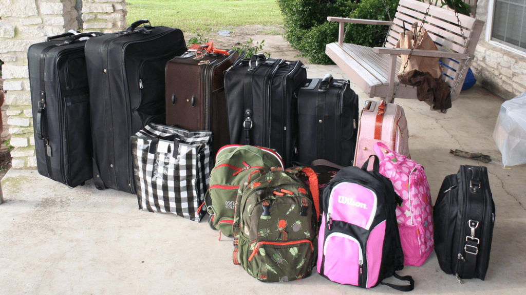 a group of luggage on the ground