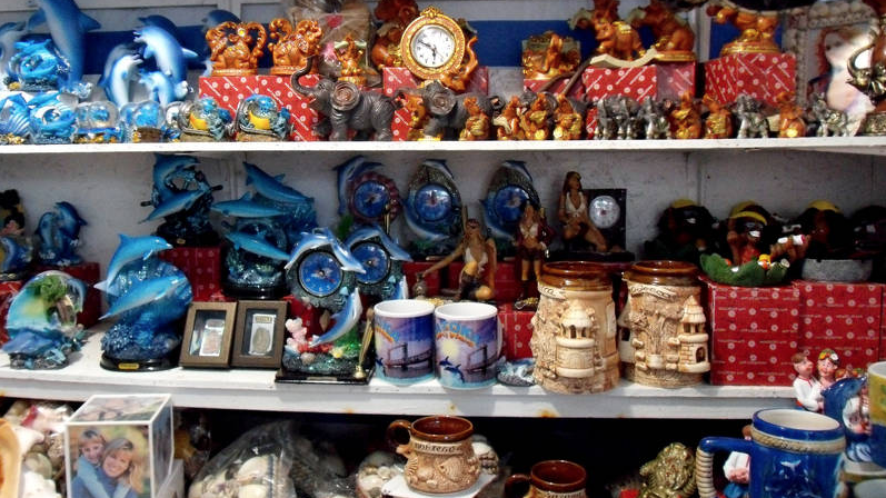 a shelf full of various items