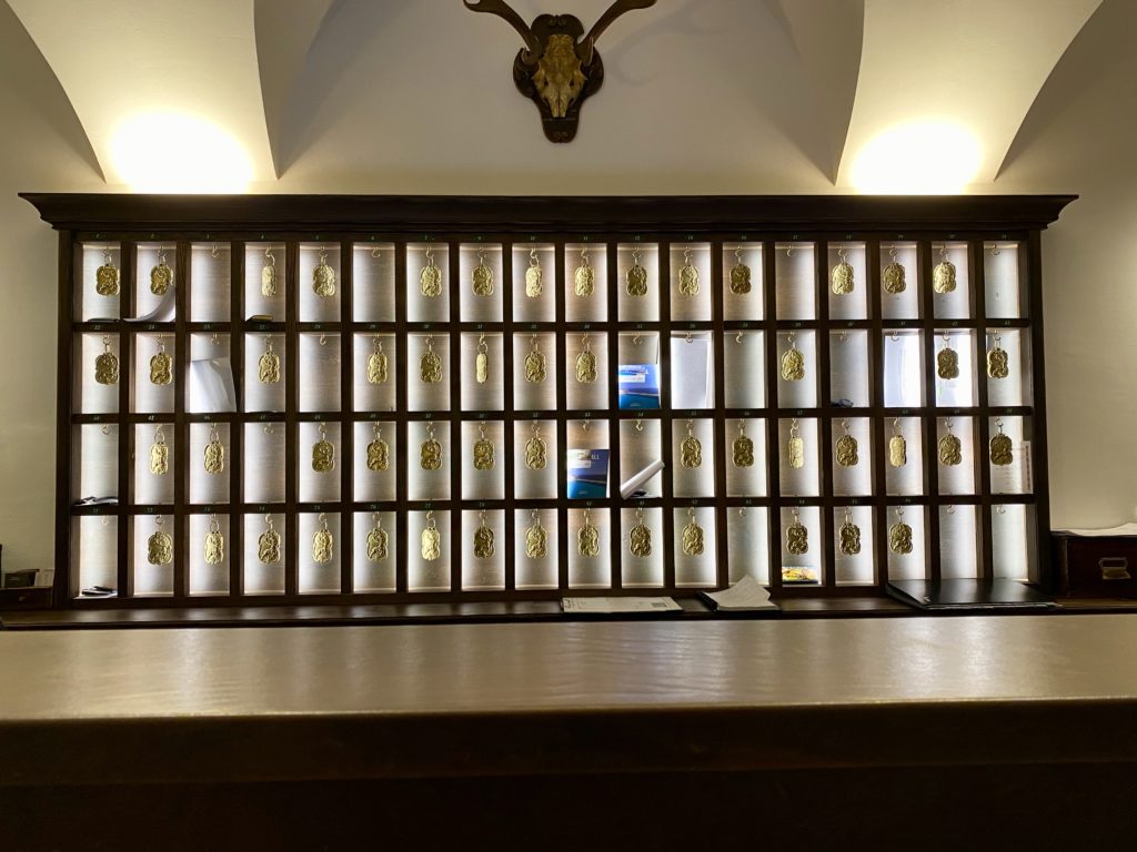 a display case with many small glass panels