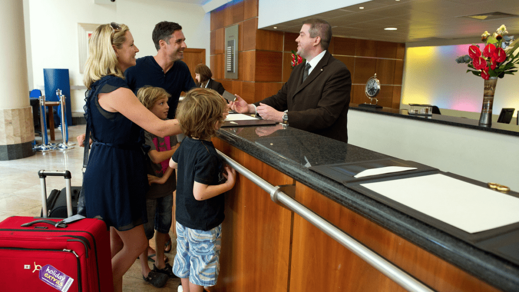 a group of people standing around a counter