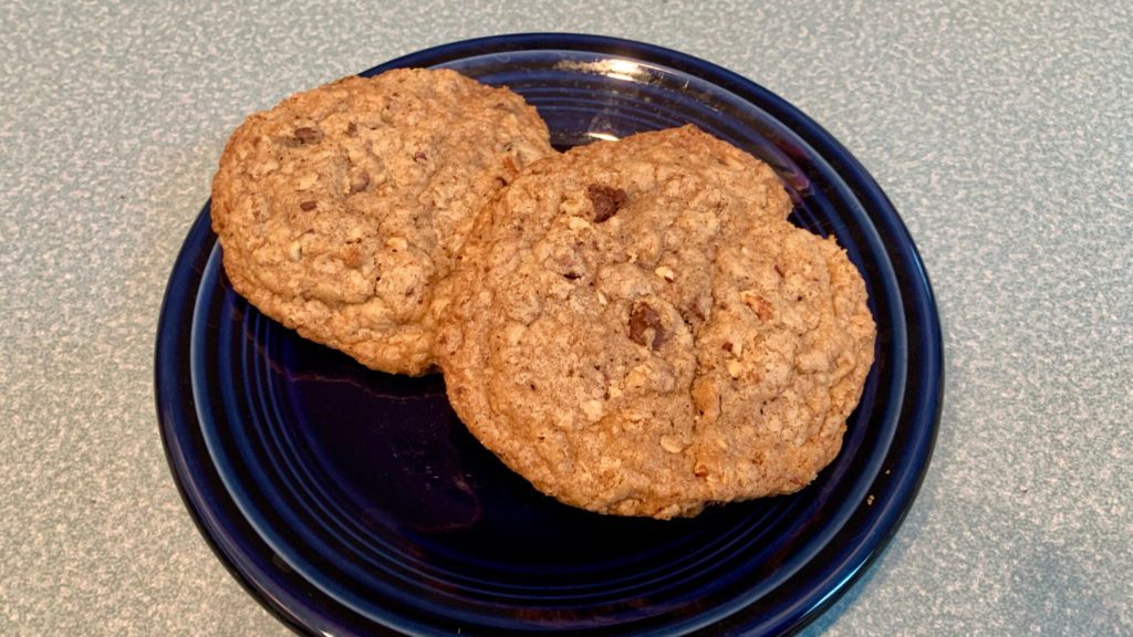 a pair of cookies on a blue plate