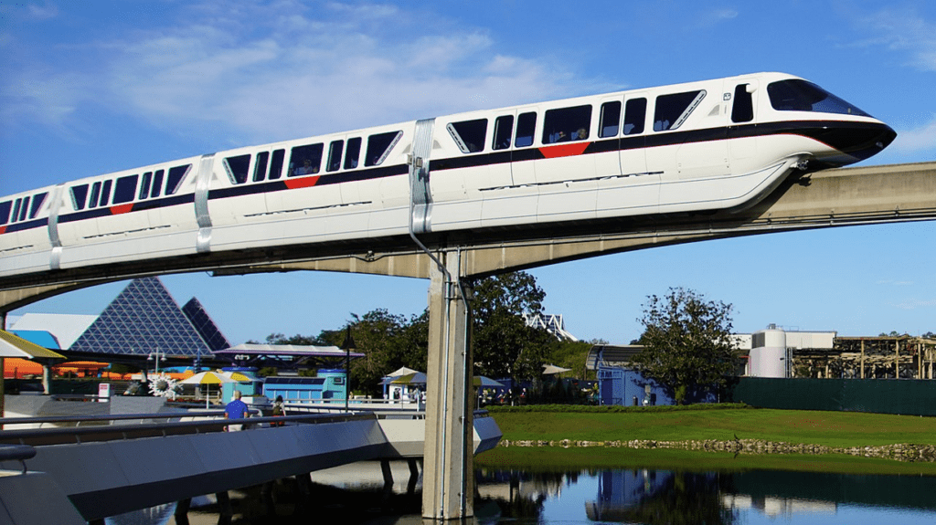a train on a bridge over water