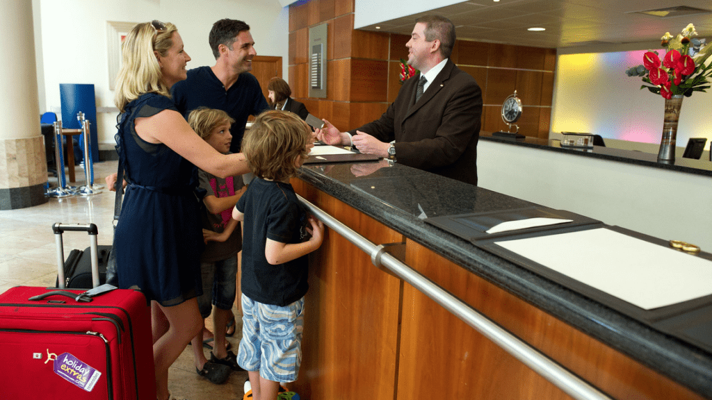 a group of people standing at a counter