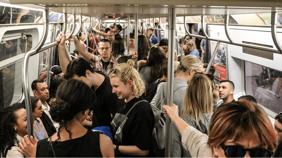 a group of people on a subway