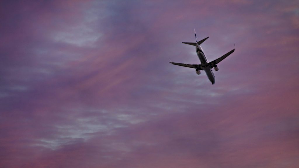 a plane flying in the sky