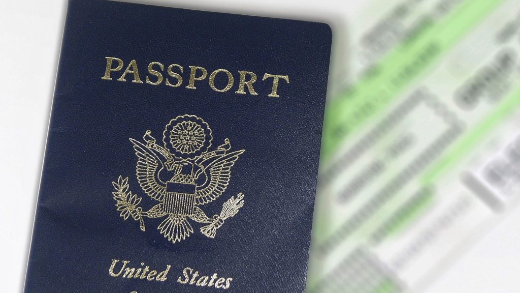 close-up of a passport with a flag on it