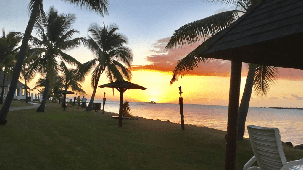 a sunset over a beach