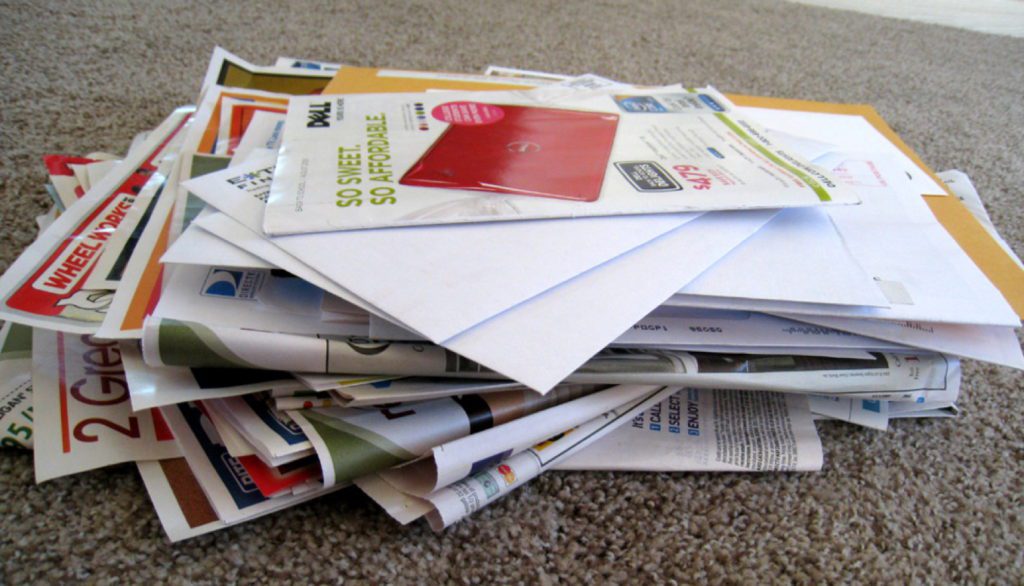 a pile of newspapers on carpet