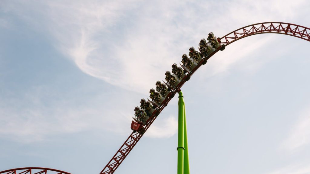 a roller coaster with people on it