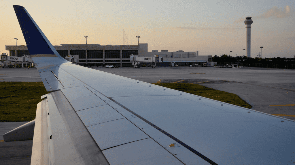 an airplane wing in an airport