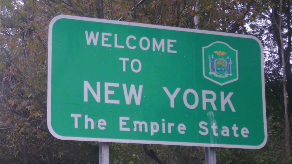 a green sign with white text