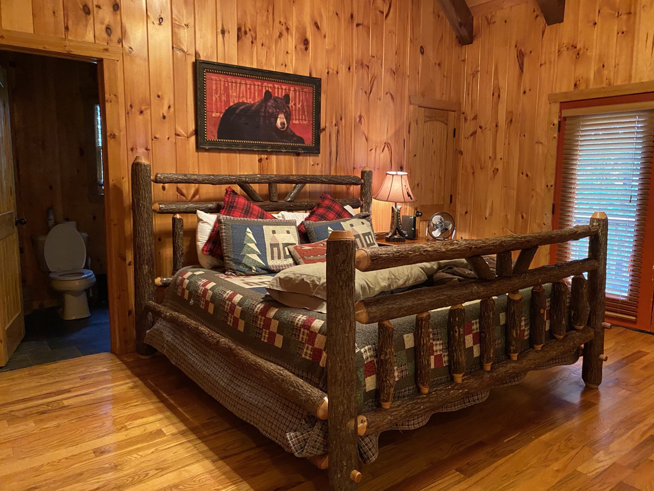 a log bed in a cabin