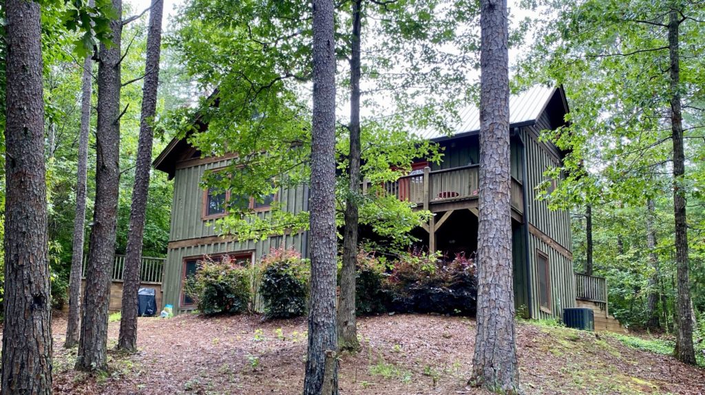 a house with trees in the back