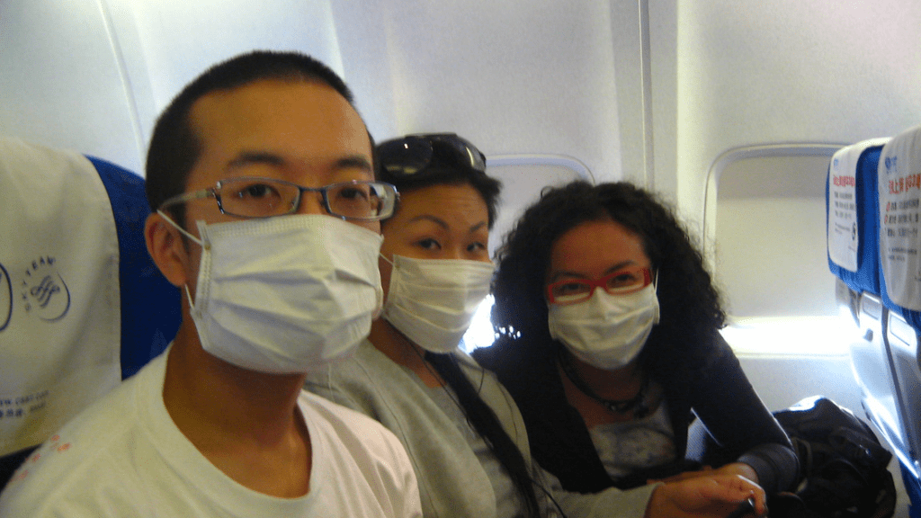 a group of people wearing face masks