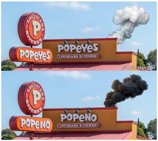 a sign with a black smoke coming out of it