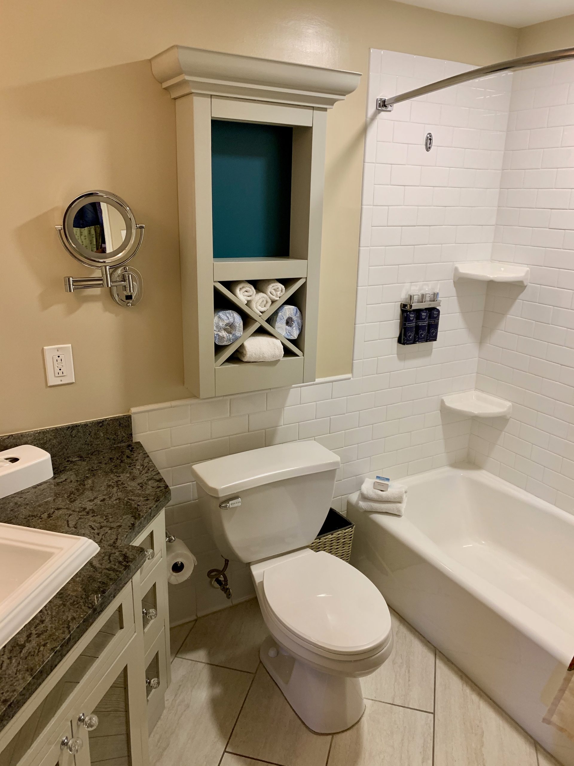 a bathroom with a toilet and bathtub