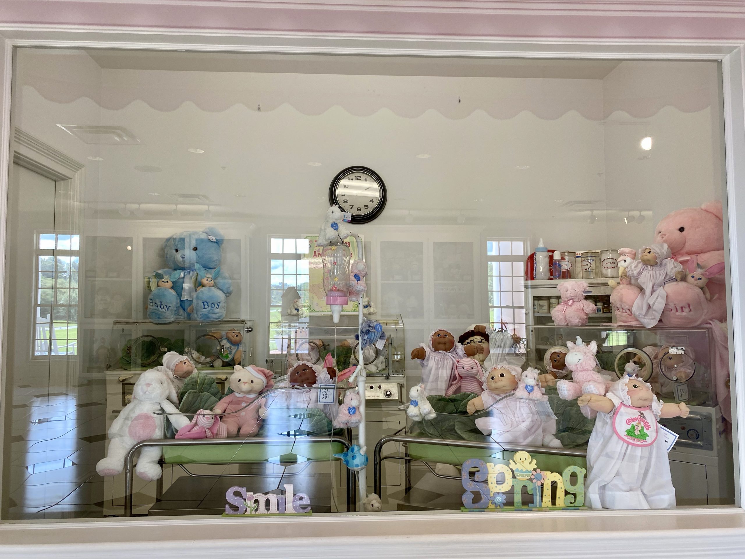 a display of stuffed toys in a room