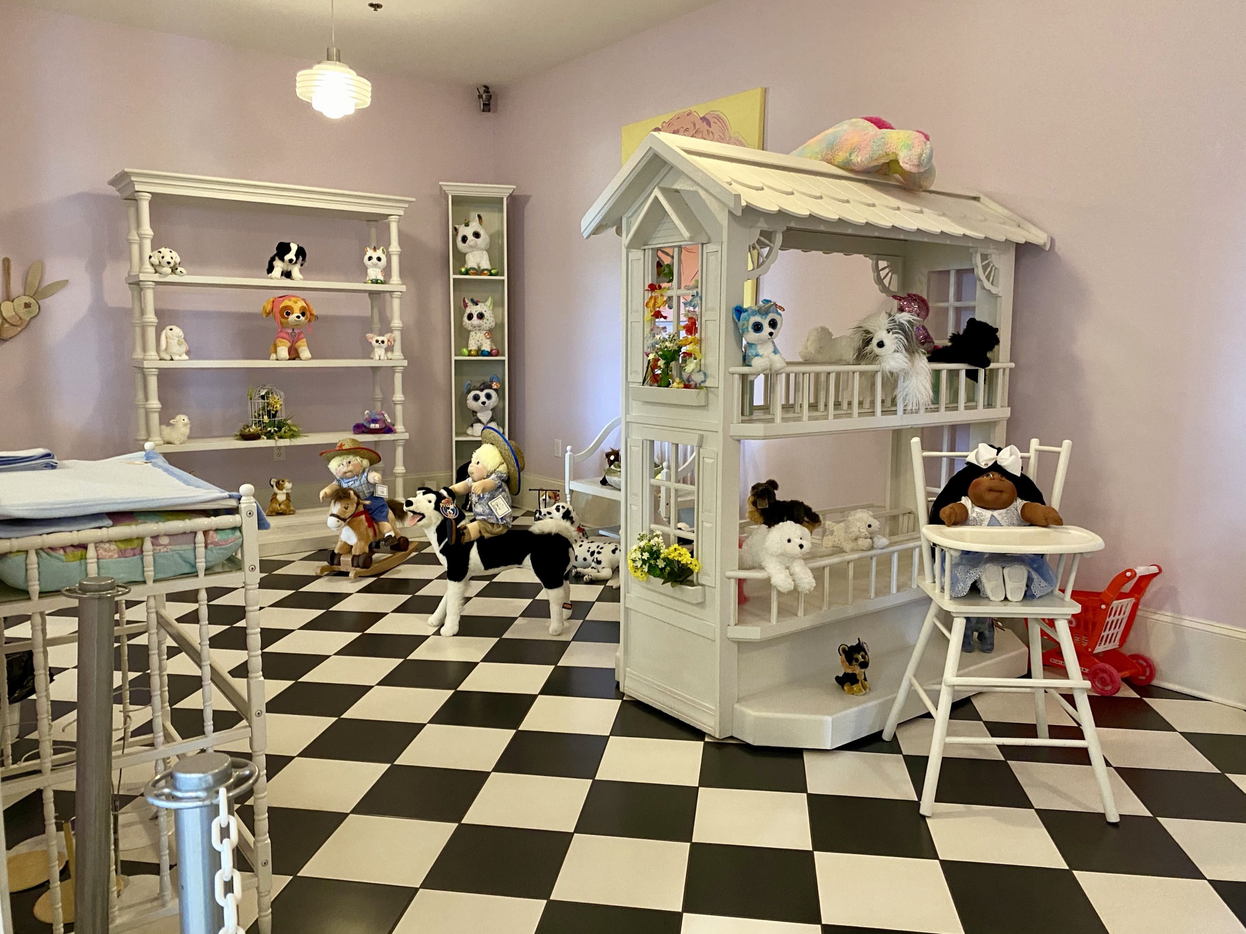 a room with toys and a checkered floor