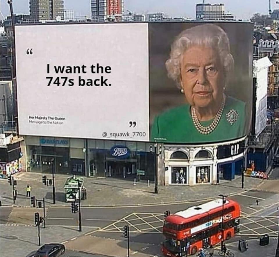 a billboard with a picture of a woman on it
